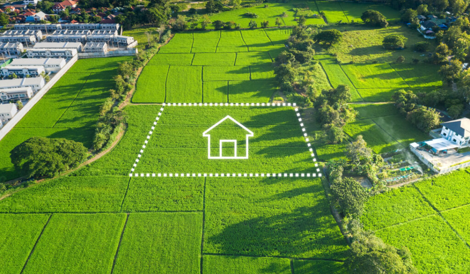 Land or landscape of green field in aerial view or bird eye view. Include agriculture farm, icon of residential, home or house building and land plot. That real estate or property for dream concept to build, construction, owned, sale, rent, buy, purchase, mortgage and investment in Chiang Mai of Thailand.